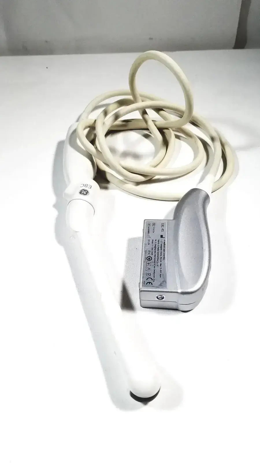 White and silver ge e8c-rs ultrasound probe transducer endo vaginal with coiled beige cable for medical use