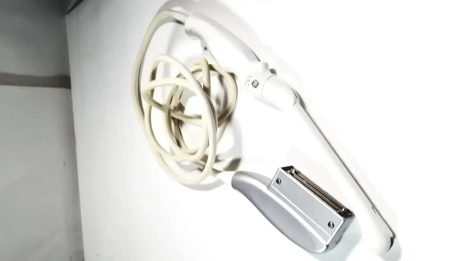 White ge e8c-rs ultrasound probe transducer endo vaginal with coiled beige cable and silver-handled control unit