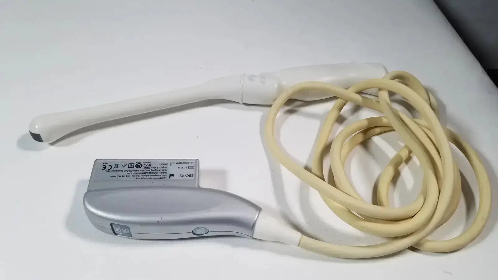 Silver and white GE E8C-RS endovaginal ultrasound probe transducer with a coiled beige cable for endovaginal ultrasound