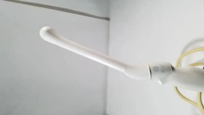 White ceramic curling iron with smooth tapered barrel and rounded handle featured in ge e8c-rs endovaginal ultrasound probe