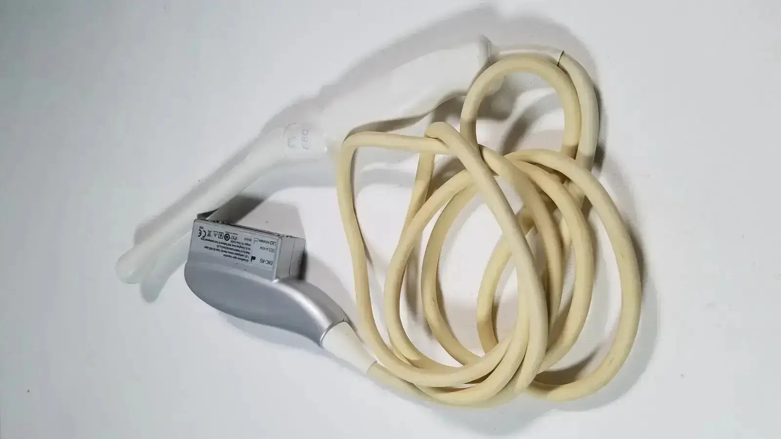 Silver-colored ge e8c-rs endovaginal ultrasound probe transducer with beige cable and rectangular label on housing