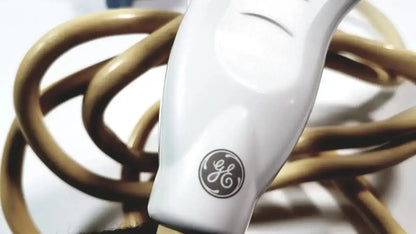 White ge healthcare 11l linear array ultrasound transducer probe with glossy handle and coiled tan electric cord