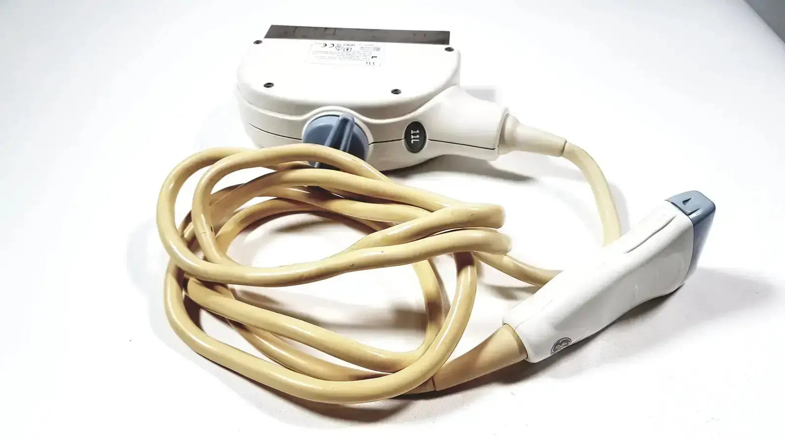GE Healthcare 11L linear array ultrasound transducer probe with white plastic housing beige cable and gray accents