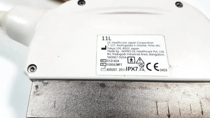 White plastic ge healthcare 11l linear array ultrasound transducer probe with metal base and manufacturer label