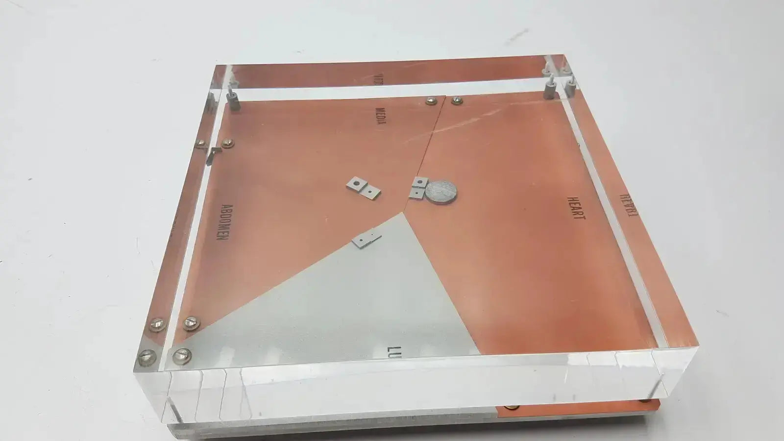 Square-shaped copper and acrylic cardiovascular phantom with transparent frame and engraved markings for buy used medical equipment
