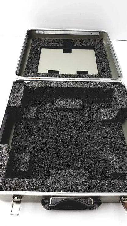 Silver aluminum travel case with black foam interior and molded compartments for ge healthcare cardiovascular phantom buy used medical equipment