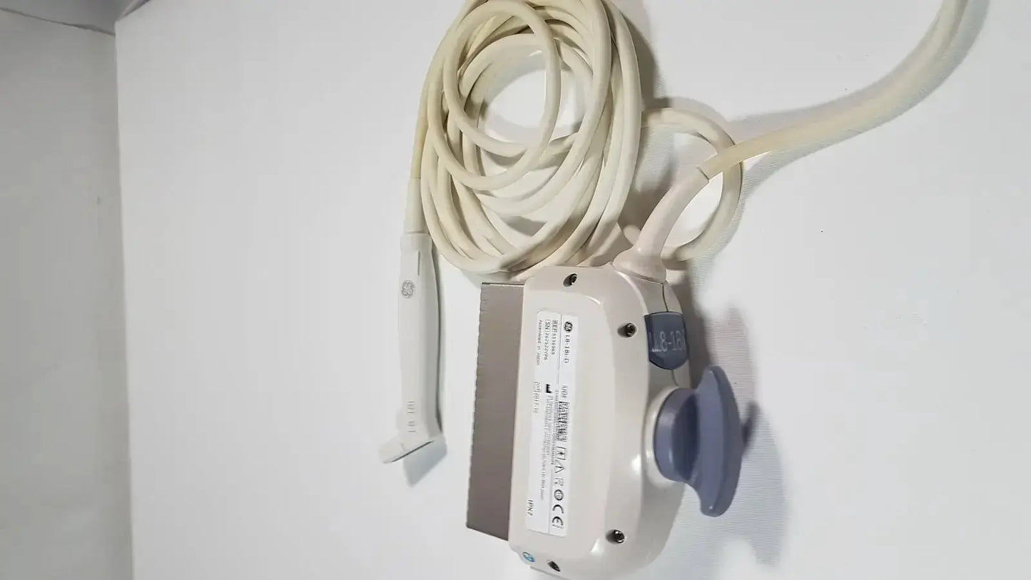 Cream-colored ge l8-18i-d linear array ultrasound transducer with gray handle blue control dial and coiled beige cable