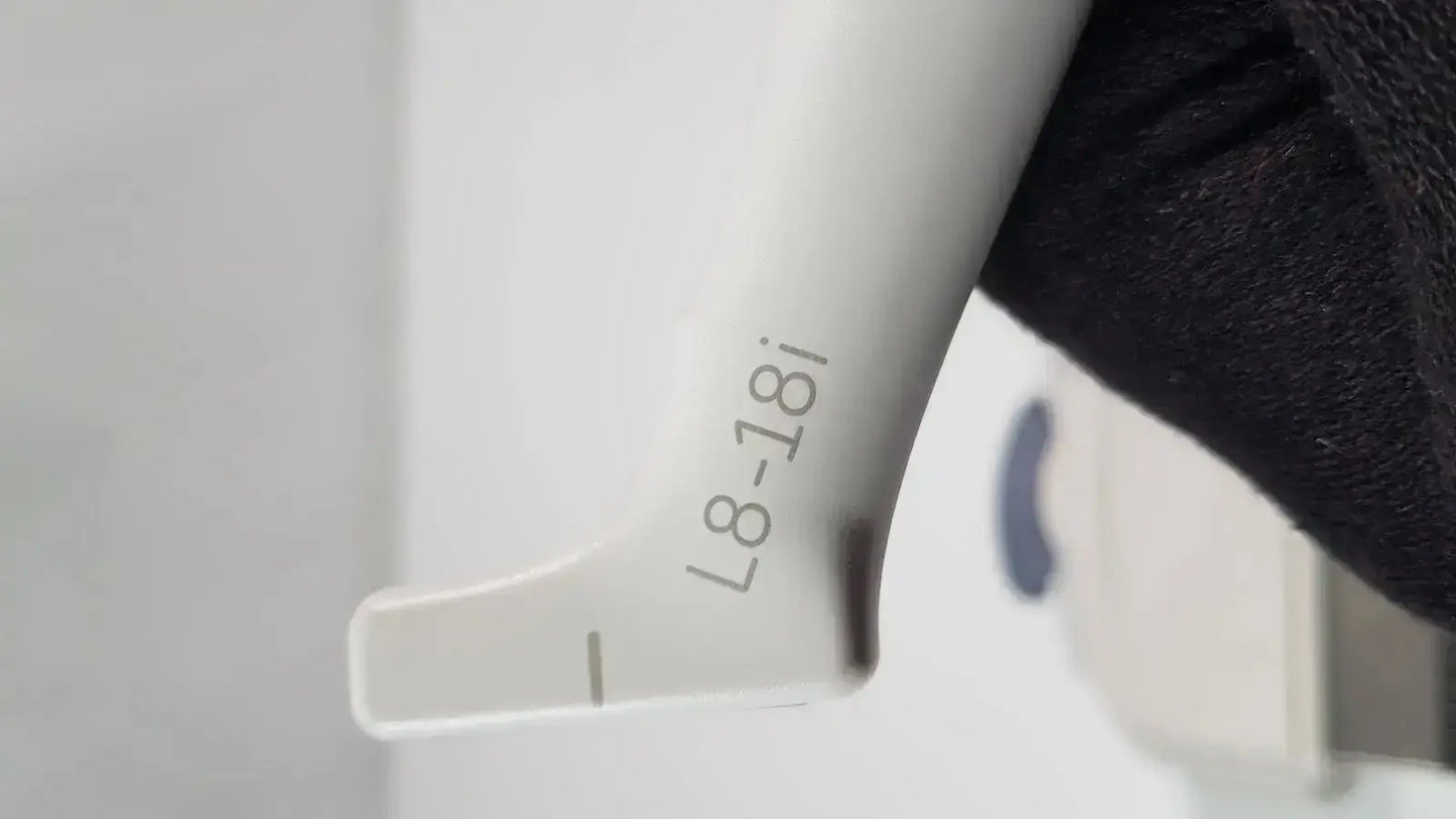 White plastic syringe with engraved model number l8-18i on barrel for ge l8-18i-d linear array ultrasound use