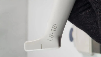 White plastic syringe with engraved model number l8-18i on barrel for ge l8-18i-d linear array ultrasound use