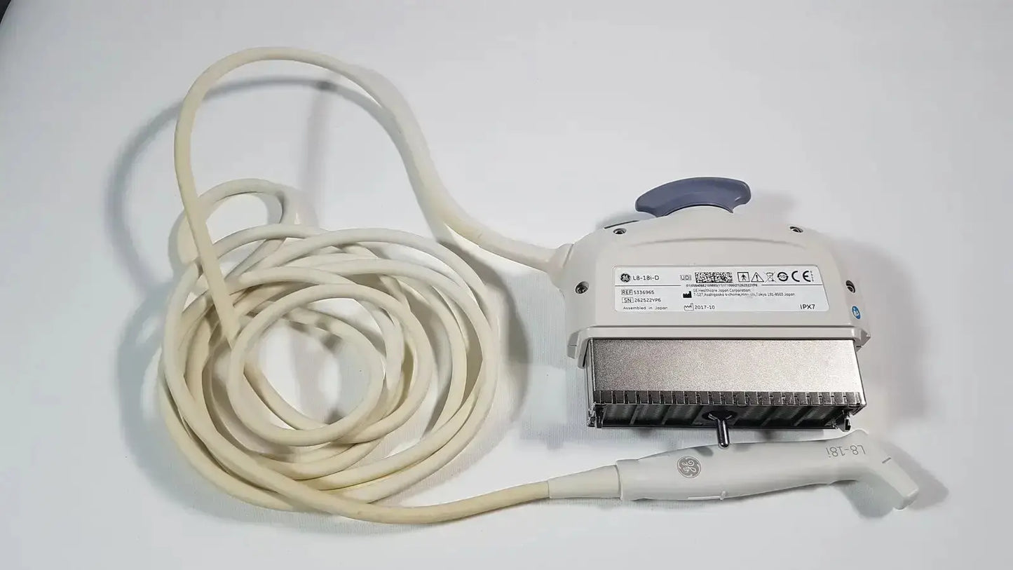 Beige ge l8-18i-d linear array ultrasound transducer with gray handle and coiled cable for array ultrasound use