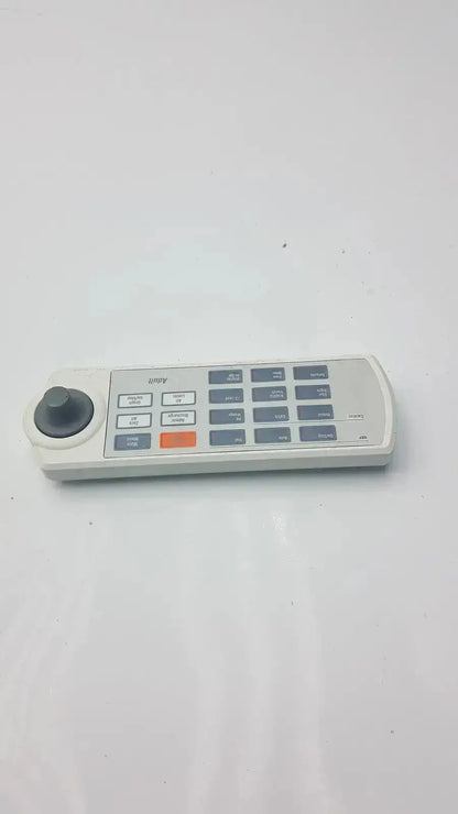 White plastic remote keypad for marquette solar 8000m-8000i with black joystick and multi colored buttons