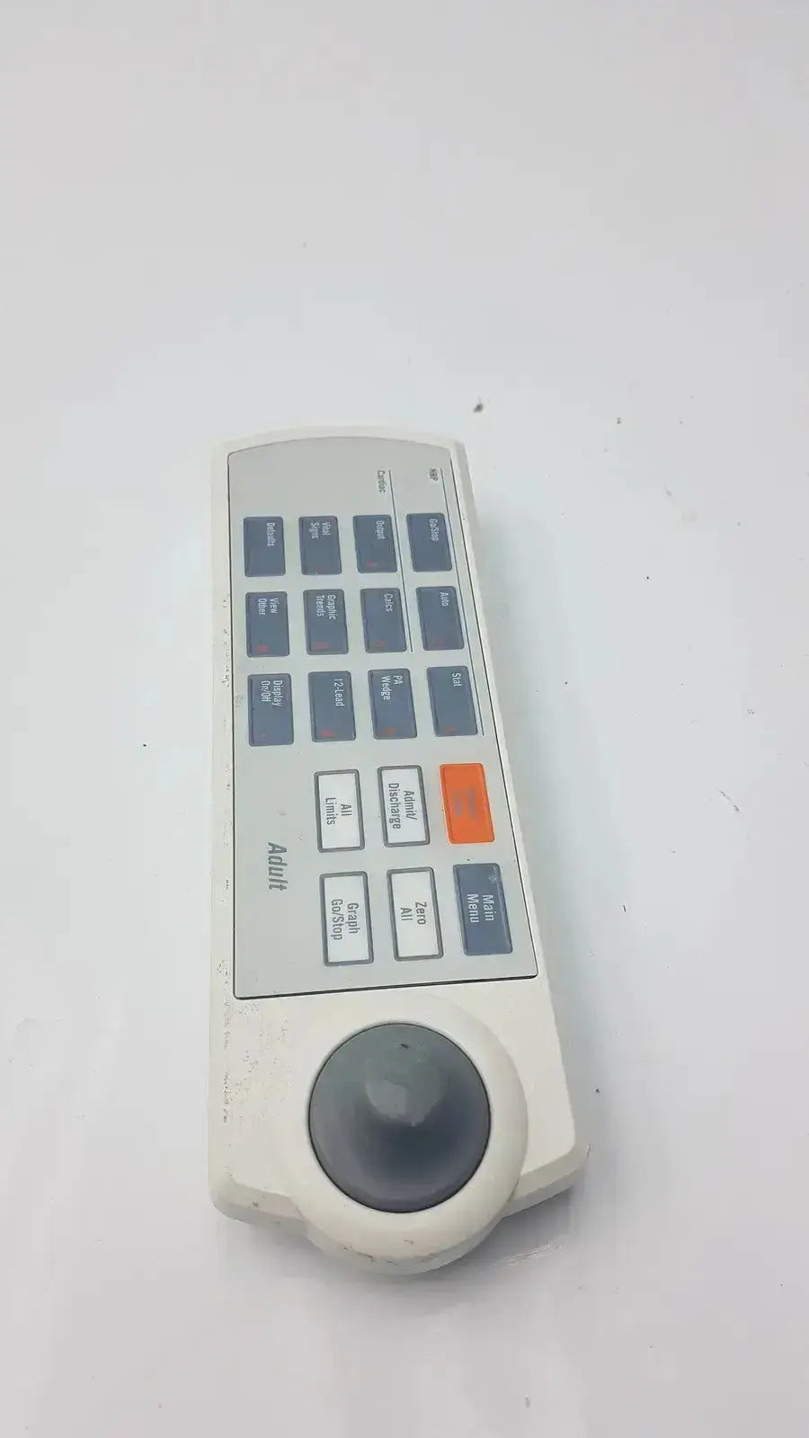 White plastic marquette solar 8000m-8000i remote keypad with gray buttons orange button and black trackball
