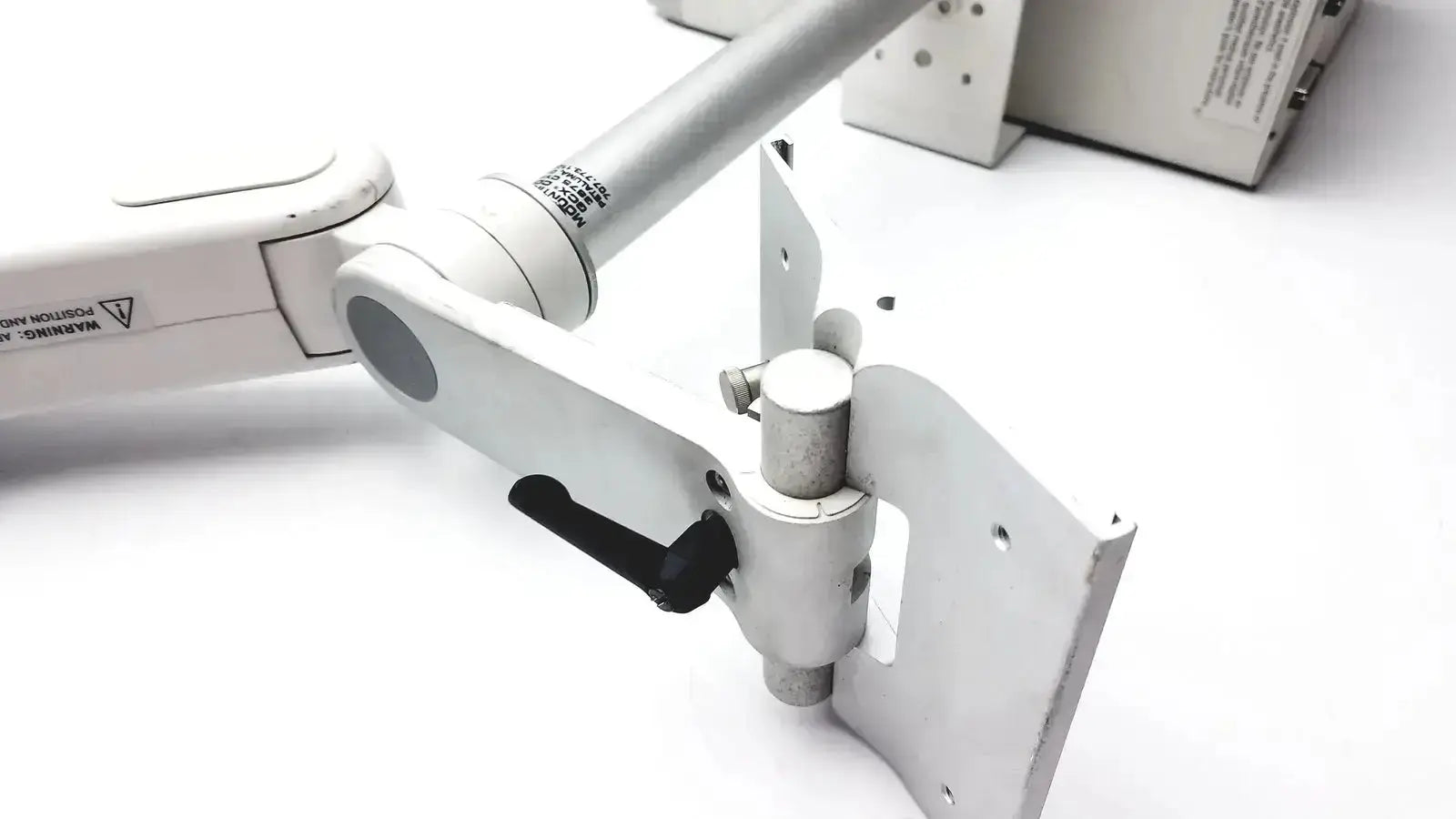 White adjustable arm mount with black handle and metallic joints for gcx monitor mount housing module 250sl