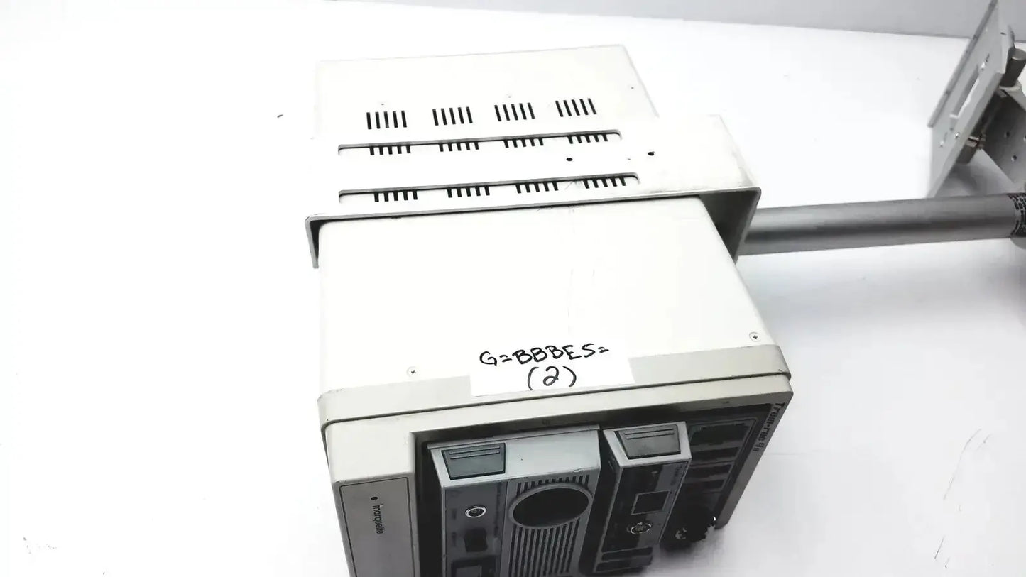 White rectangular GE Marquette Tram-rac 4A housing module 250SL with ventilation slots and GCX monitor mount arm