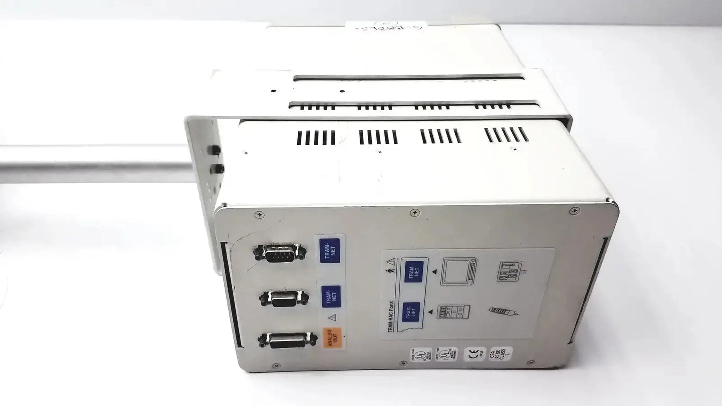 White industrial control panel showing the back side of ge marquette tram-rac housing module 250sl with gcx monitor mount arm ports and buttons