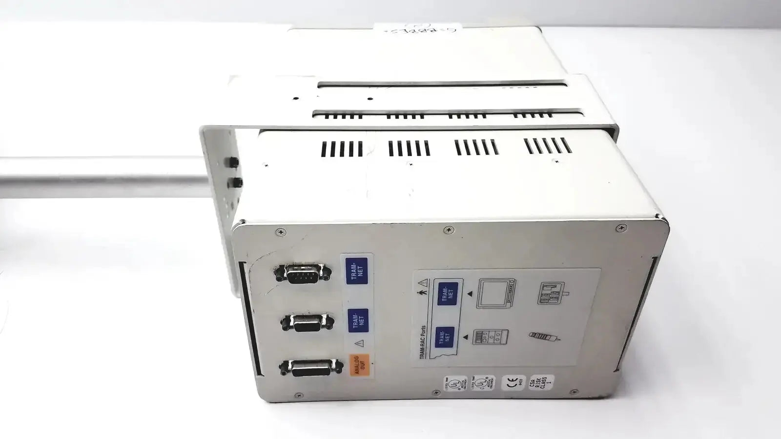 White industrial control panel showing the back side of ge marquette tram-rac housing module 250sl with gcx monitor mount arm ports and buttons