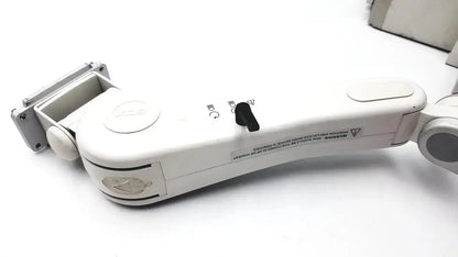 White plastic articulated gcx monitor mount arm with black rotary knob and metallic bracket for housing module 250sl