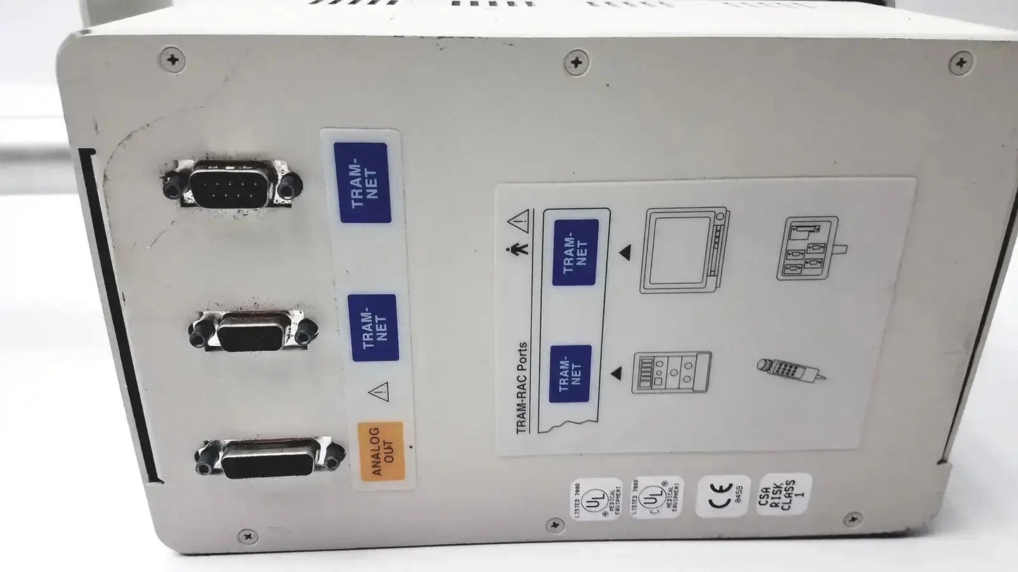 White housing module 250sl back side with three db-25 tram-net connectors and gcx monitor mount arm by ge marquette
