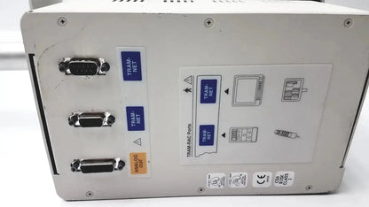 White housing module 250sl back side with three db-25 tram-net connectors and gcx monitor mount arm by ge marquette