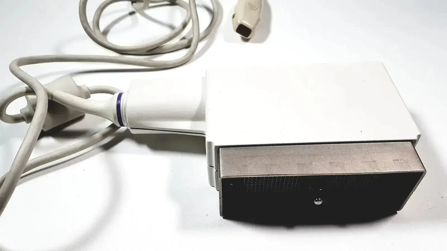 White and black phased array probe with metallic front panel and gray coiled cables for ge logiq and vivid series