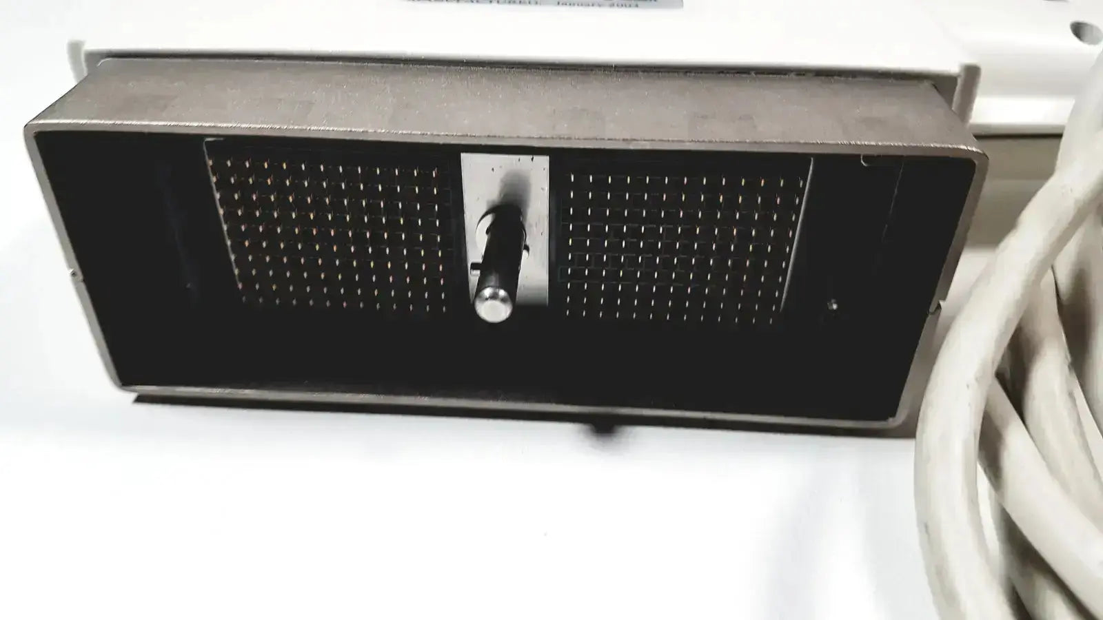 Black rectangular phased array probe speaker with perforated grille and silver knob in metallic casing for GE Medical use