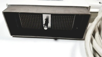 Black rectangular phased array probe speaker with perforated grille and silver knob in metallic casing for GE Medical use