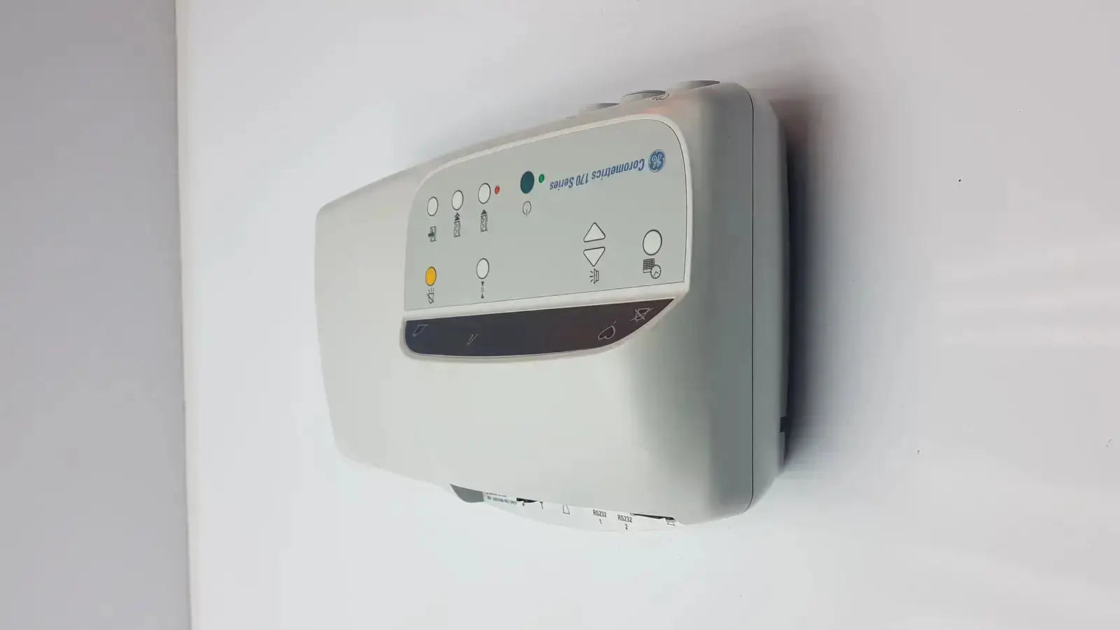 Gray wall-mounted air dryer with control panel and indicator lights for GE Medical external fetal monitor model 171