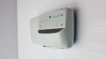 Gray wall-mounted air dryer with control panel and indicator lights for GE Medical external fetal monitor model 171