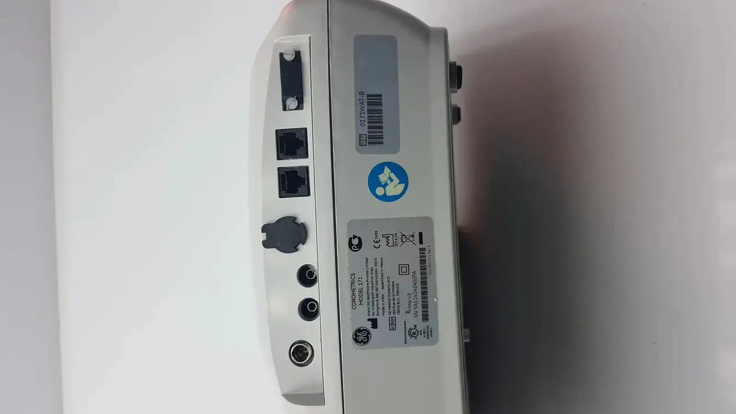 Gray plastic external fetal monitor with multiple ports and barcode label for ge medical corometrics 170 series model 171
