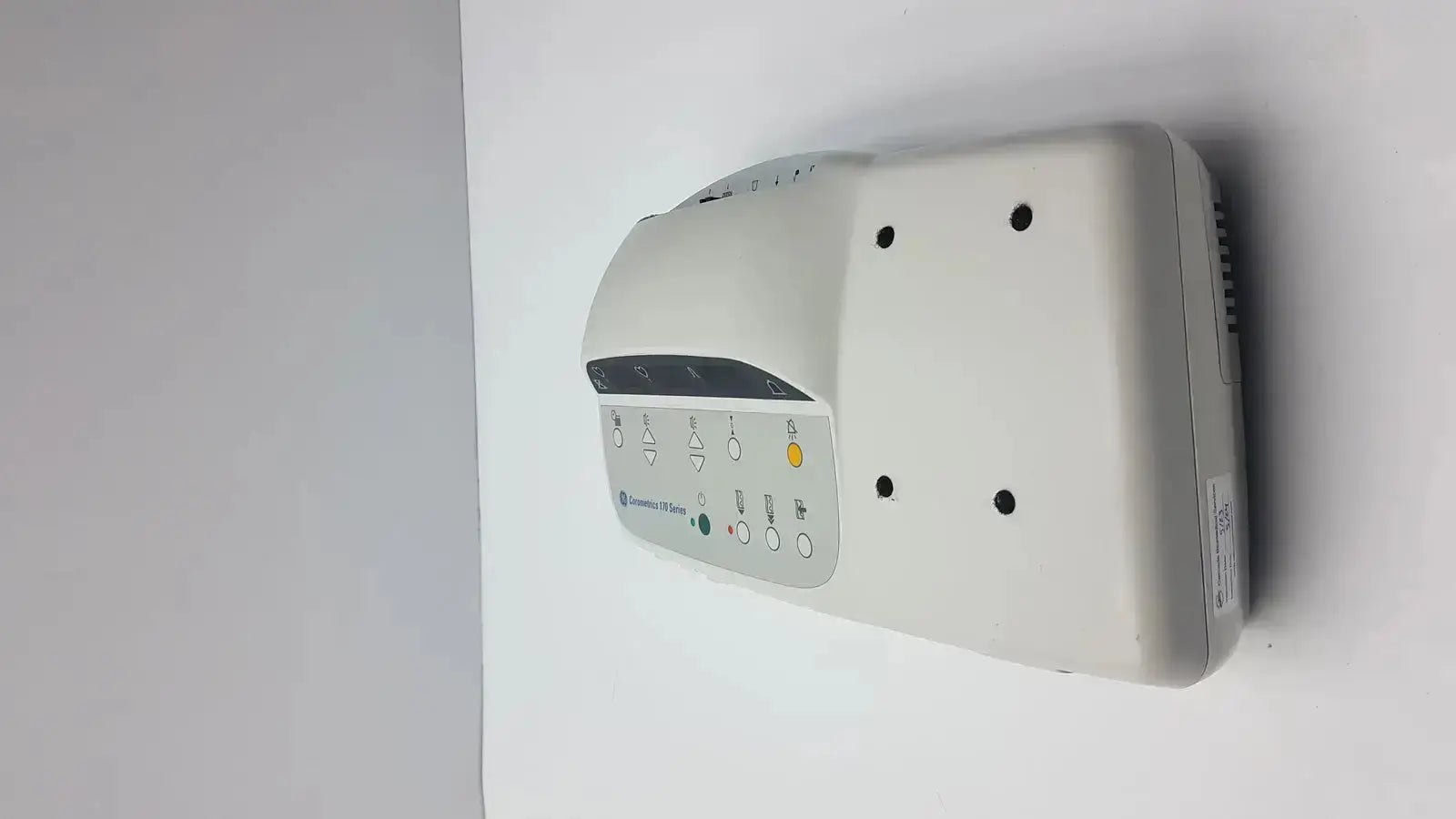 White plastic wall-mounted external fetal monitor with control panel and indicator lights ge medical corometrics 170 model 172