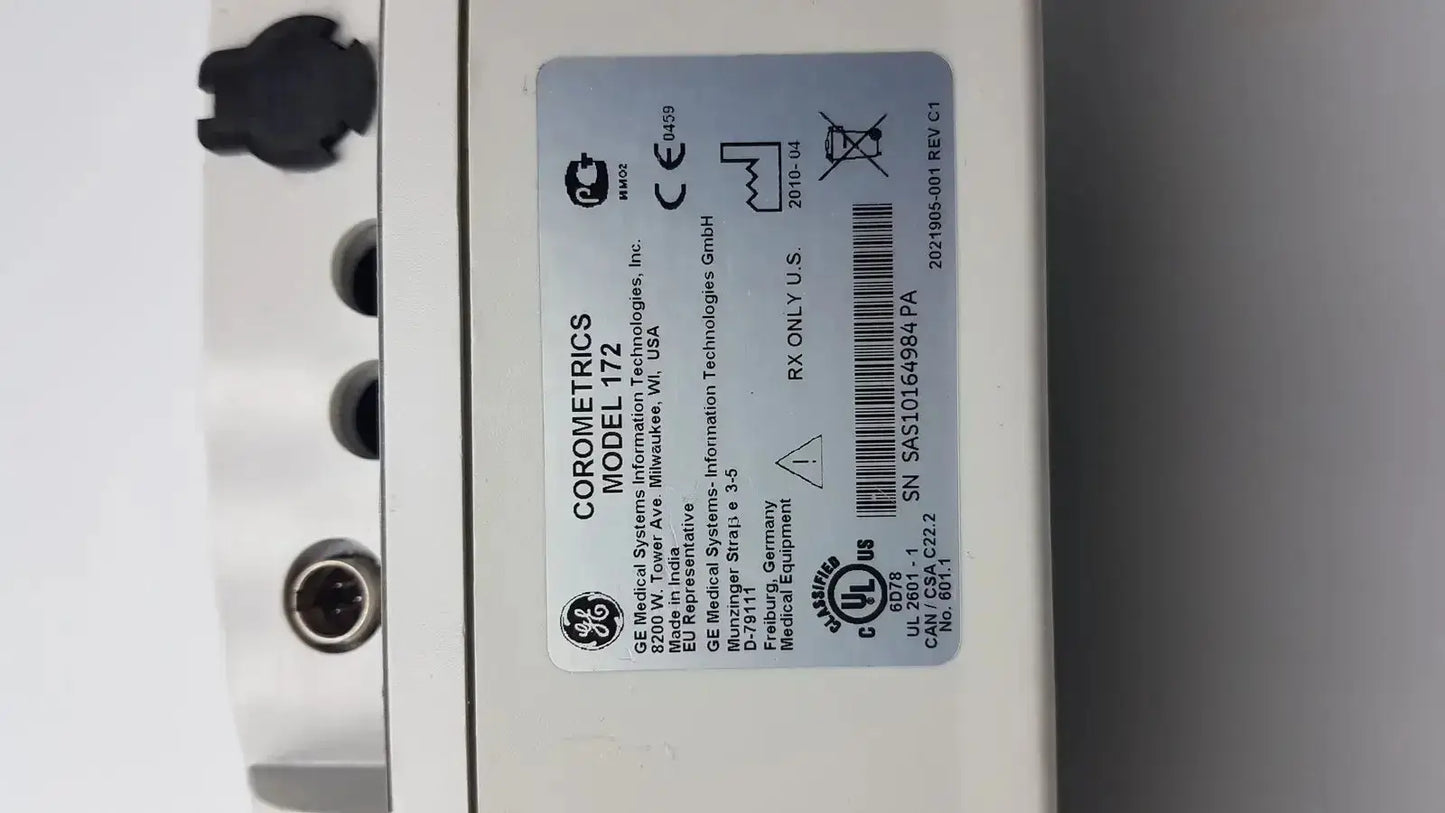 White plastic label with black text showing ge corometrics model 172 for external fetal monitor device use