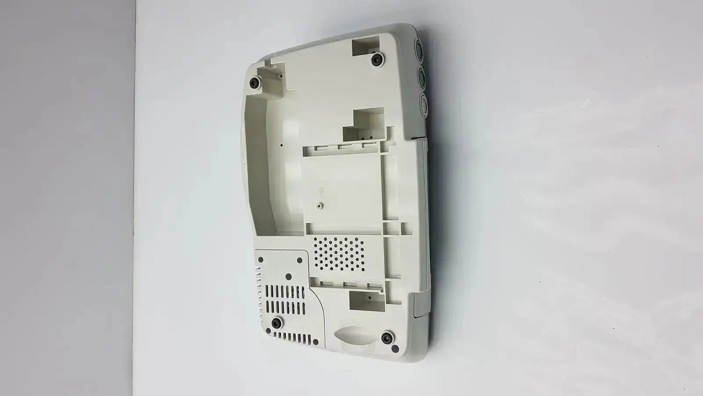 Off-white plastic shell of nintendo ds lite with molded compartments for ge medical corometrics 172 external fetal monitor