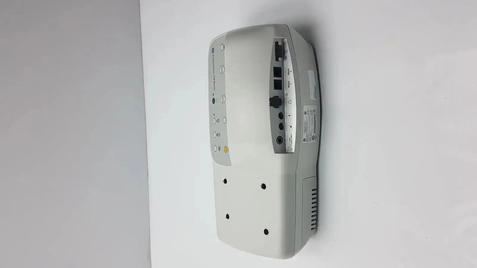 White plastic external fetal monitor ge medical corometrics 170 series model 172 with multiple ports and control buttons on side