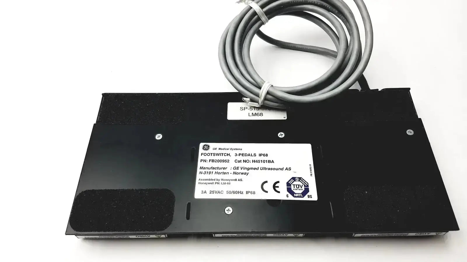 Black GE medical systems footswitch 3-pedals with coiled gray cable and labeled specifications for medical systems use