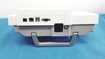 White and gray plastic back side of ge medical systems mac 800 ecg machine with usb ethernet and serial ports