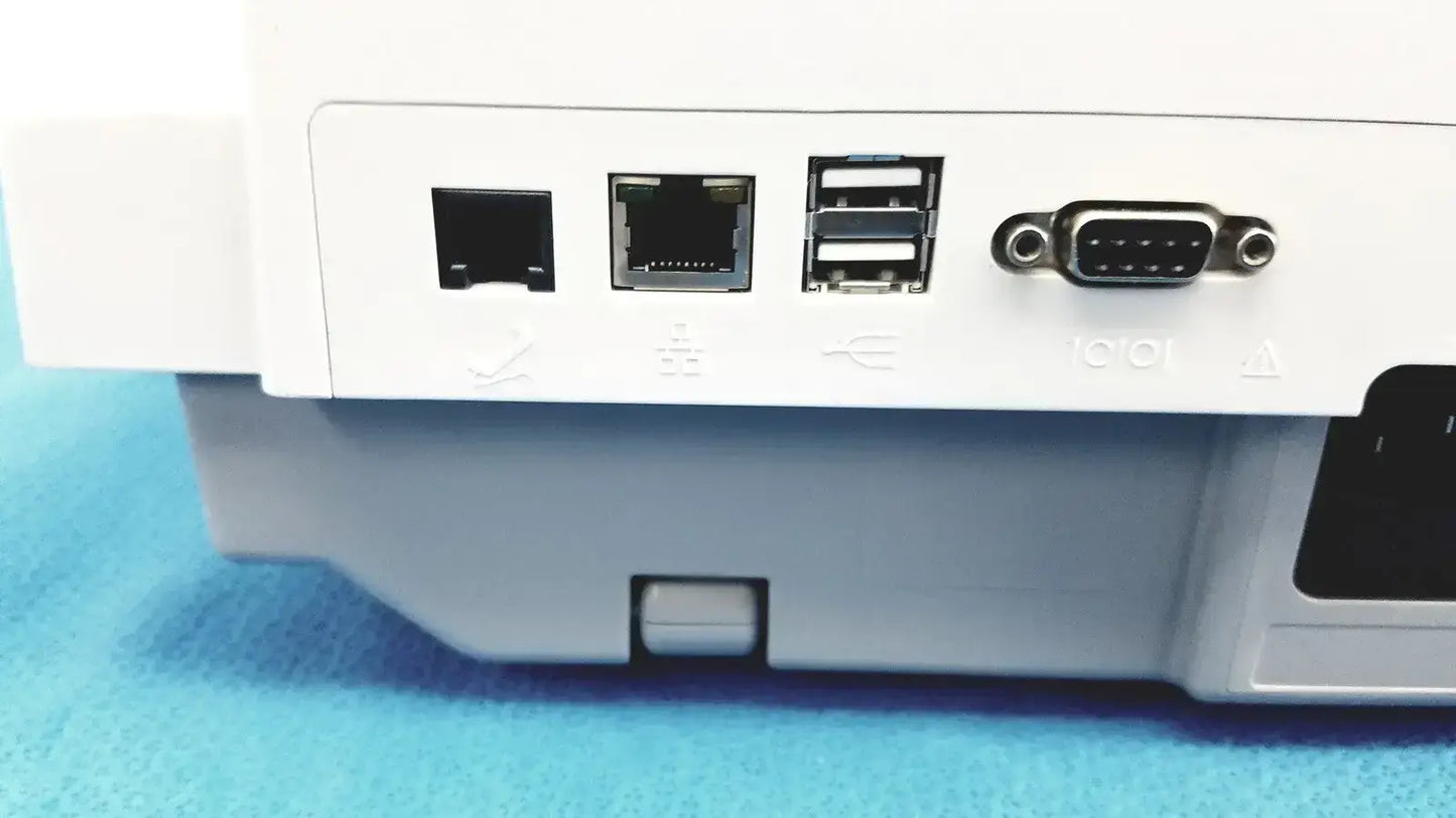White plastic rear panel of ge medical systems mac 800 ecg machine with ethernet, usb, and dvi connectors