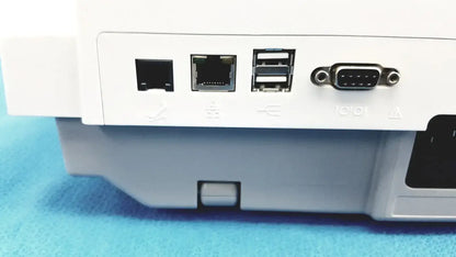 White plastic rear panel of ge medical systems mac 800 ecg machine with ethernet, usb, and dvi connectors