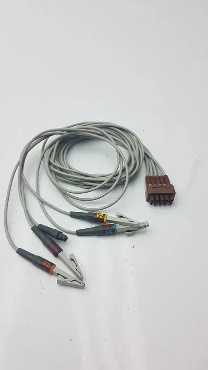 Gray coiled multi-link ecg leadwire with multiple alligator clips and brown multi-pin connector for leadwire 5-lead v2-6 use