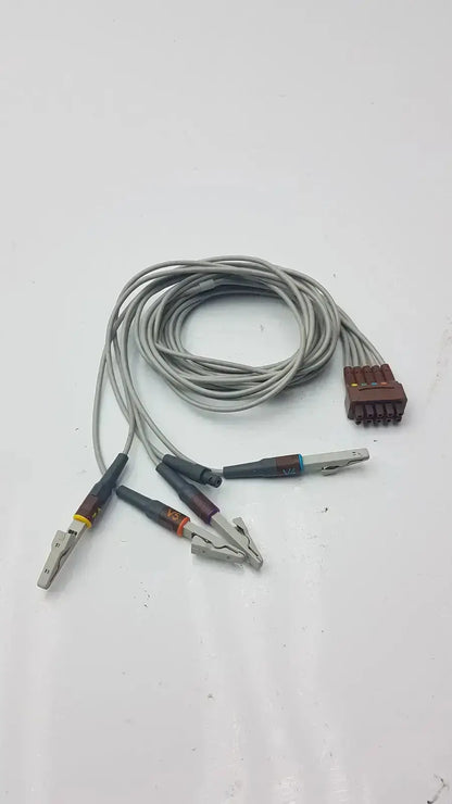 Gray coiled multi-link ecg leadwire 5-lead v2-6 with alligator clips and brown multi-pin connector for medical use