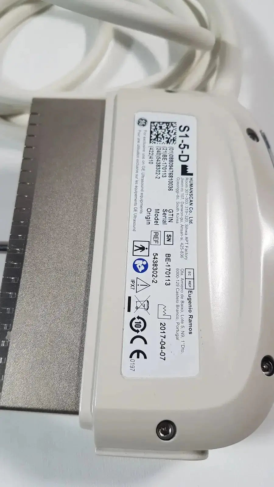 Beige plastic phased array ultrasound probe with metallic silver connector and white cable labeled s1-5-d by huaxiscan co ltd