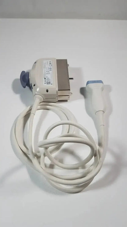 White ge s1-5-d phased array ultrasound probe with blue-tipped probe, beige housing, and coiled cable for medical use