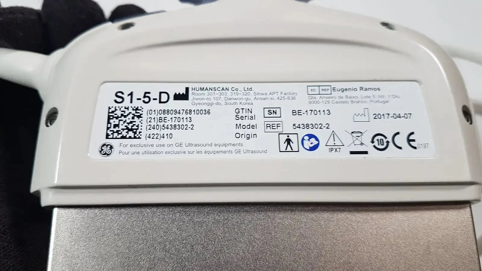 White plastic ge s1-5-d phased array ultrasound machine with label showing model serial number and regulatory markings