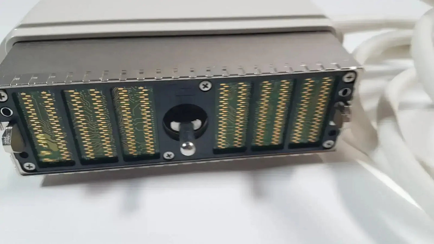 Silver metallic server rack module with green circuit boards and gold connectors in ge s1-5-d phased array ultrasound probe