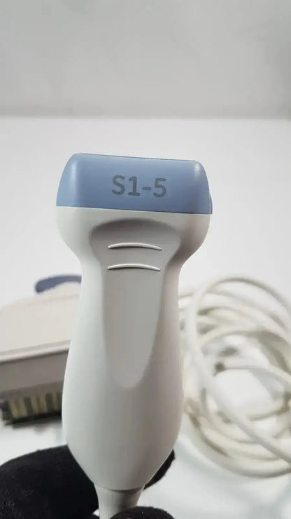 Gray and light blue ge s1-5-d phased array ultrasound probe with s1-5 printed on top for medical imaging
