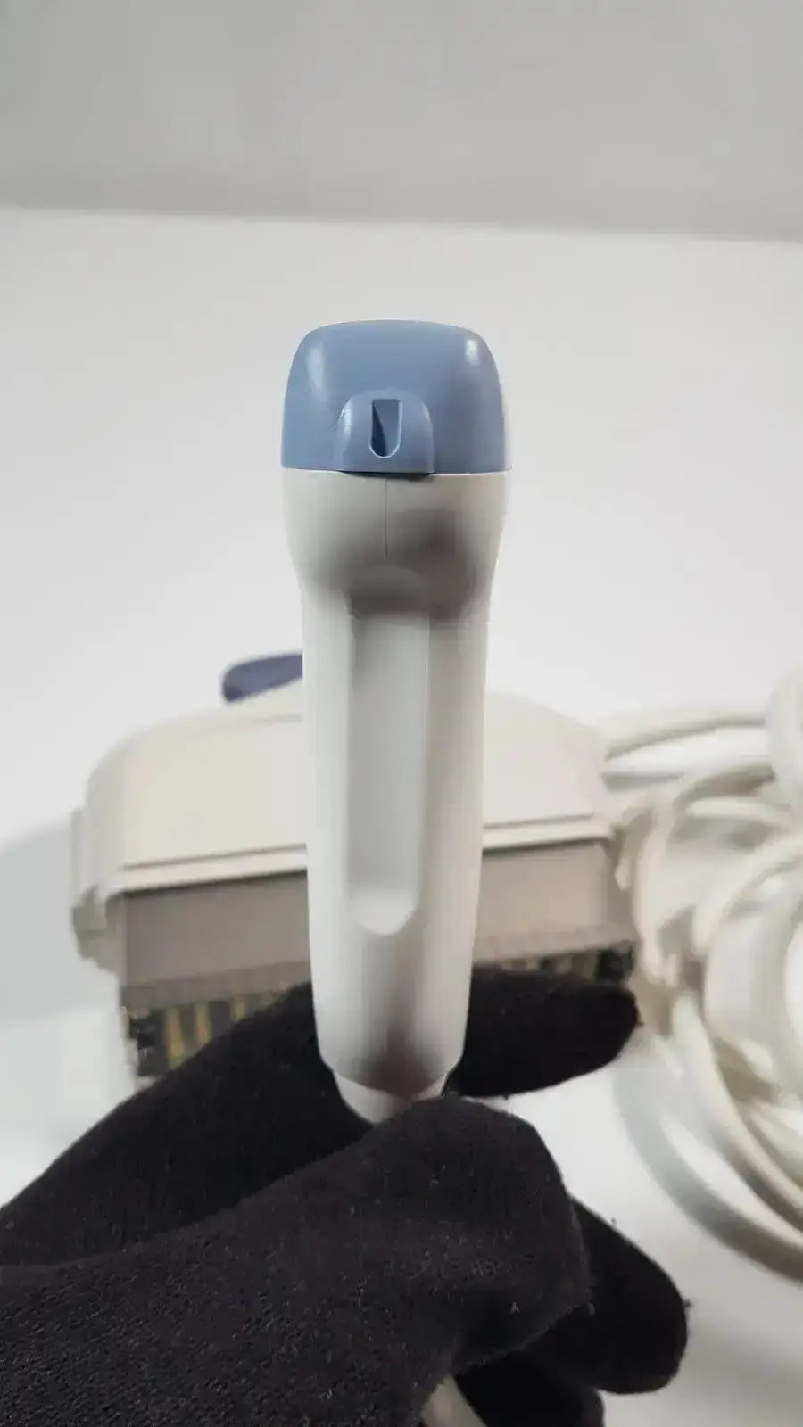 Blue and gray handheld barcode scanner with sleek ergonomic design for s1-5-d phased array ultrasound probe use