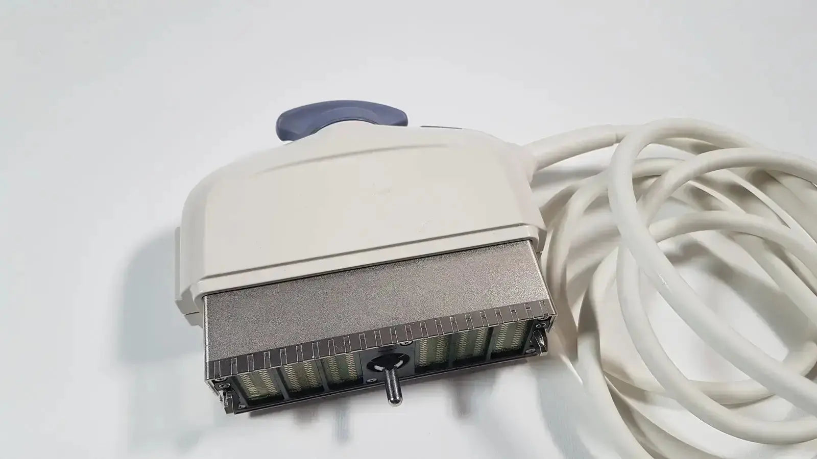 Beige and gray phased array ultrasound probe s1-5-d with blue handle for medical imaging by GE