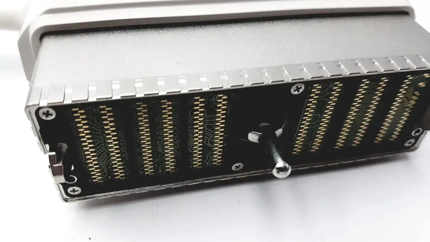 Silver metallic industrial connector with gold-plated pins and toggle switch on back of ge s1-5-d ultrasound transducer probe