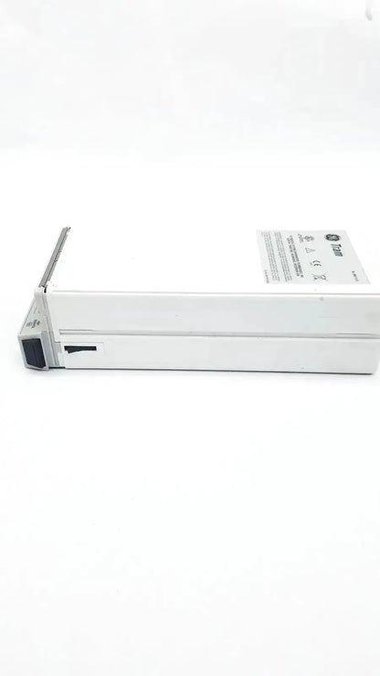 White metal server drive bay with label and black latch for the medical tram 451m patient monitor module