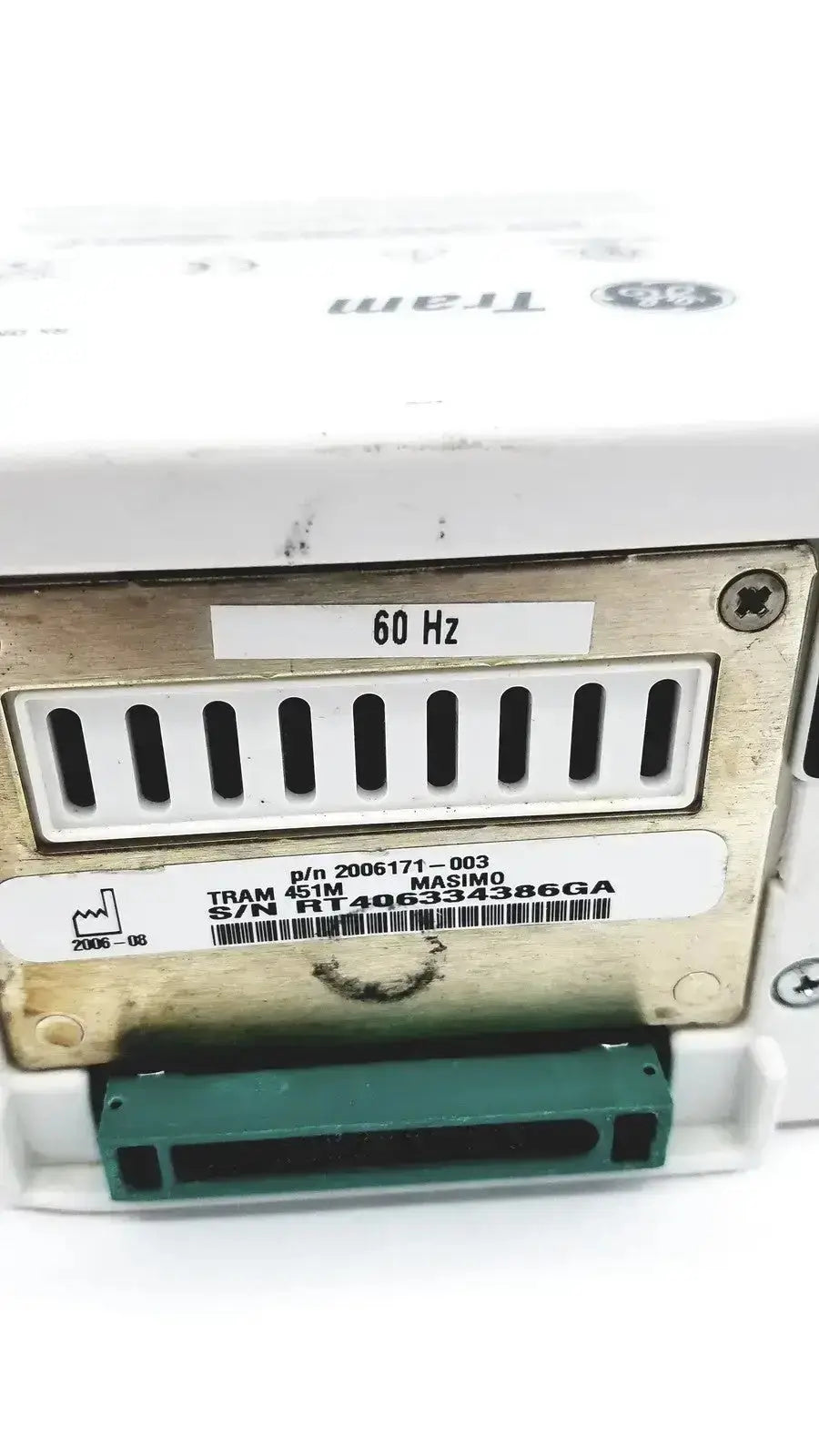 White general electric medical systems tram 451m patient monitor module with green connector and metal label plate
