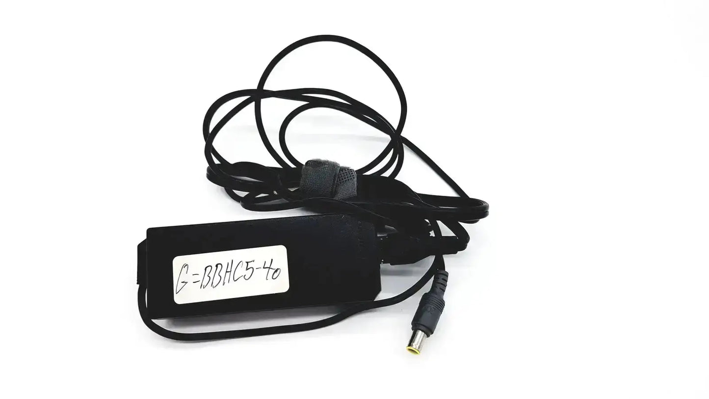 Black plastic lenovo 90w power supply with round tip 42t5000 and coiled cable featuring a small white label